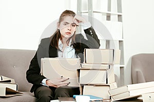 Sadness depressed businesswoman with many folders of documents, frustration secretary girl, stressed employee working