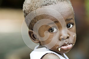 Sadness Despair Depression Symbol: Little African Black Boy Crying Sadly. Little African sad boy. photo