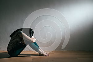 Sadness young woman resting in white background