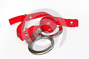 Sadomasochism gag isolated on a white background with handcuff photo