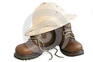 Safari boots and hat isolated