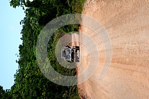 Safari jeep on dirt road