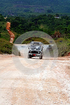 Safari jeep on dirt road