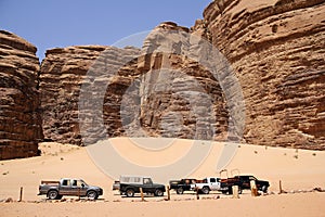 Safari jeeps in the valley of Laurence of Arabian photo