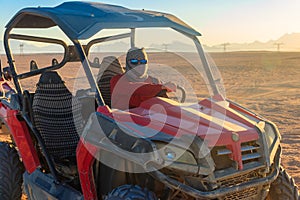 Safari trip through egyptian desert driving buggy cars