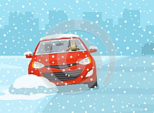 Safe car driving at winter season. Front view of a sedan skidding across the icy road. Red car loses control and gets stuck.