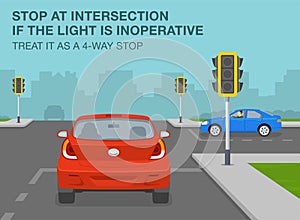 Safe driving tips and traffic regulation rules. Stop at intersection if the traffic light is inoperative, treat it as a 4-way stop photo