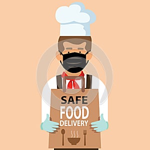 Safe food delivery at home during coronavirus covid-19 epidemic: delivery man holding a bag with fast food, he is wearing a face