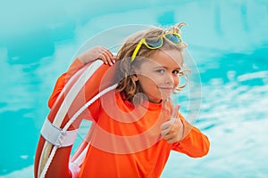 Safe guard kid. Funny child on beach.