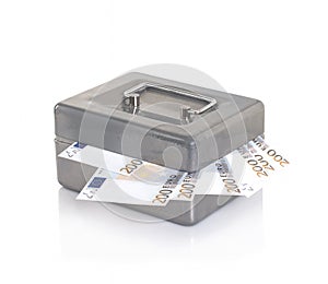 Safe with money on a white background. Isolated