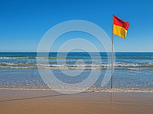 Safe swimming flag on a beach on a sunny day