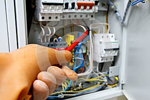 Safe working with electricity, wearing on the hand of the dielectric rubber glove