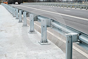Safety barrier on freeway bridge