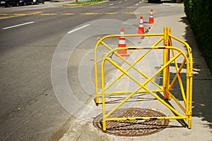 Safety barrier at manhole