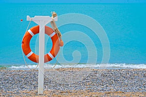 Safety vacation beach sea lifebuoy resort concept swimming safe rescue, concept red buoy from lifesaver from seascape