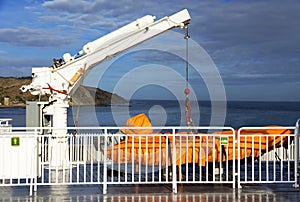 Safety boat lift on a ship