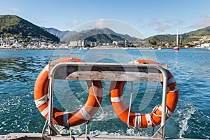 Safety buoys on boat leaving Picton harbour in New Zealand