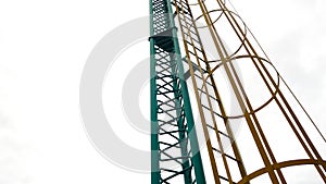 Safety cage ladder for telecommunication service.