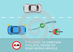 Safety car driving tips. `No overtaking` restriction area. It is legal to overtake cyclists, horse or road works vehicle. photo