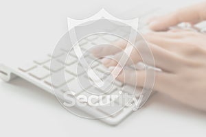 Safety computer security concept. Internet protection symbol on blured keyboard background. Concept image of security