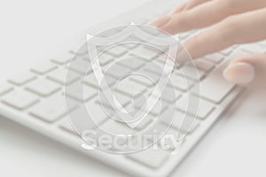 Safety computer security concept. Internet protection symbol on blured keyboard background. Concept image of security