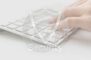 Safety computer security concept. Internet protection symbol on blured keyboard background. Concept image of security