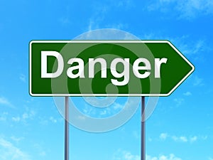 Safety concept: Danger on road sign background