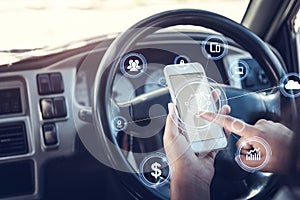 Safety concept,Hands using smartphone setting the navigation before driving car