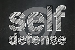 Safety concept: Self Defense on chalkboard background