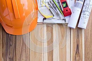 Safety equipment and tool kit on wooden table