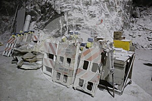 Safety equipment and tools piled up underground at a salt mine