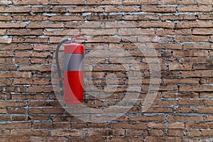 Safety fire extinguisher on the wall