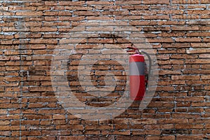 Safety fire extinguisher on the wall