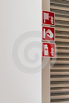 Safety fire extinguisher on the wall