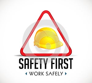 Safety first concept - work safely sign yellow helmet as warning sign