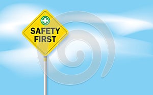 safety first sign and clouds on blue sky background