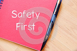 Safety first text concept on notebook