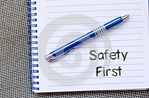 Safety first text concept on notebook