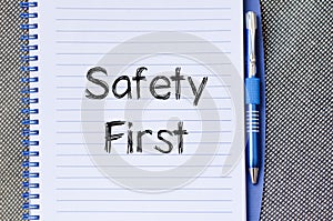 Safety first text concept on notebook