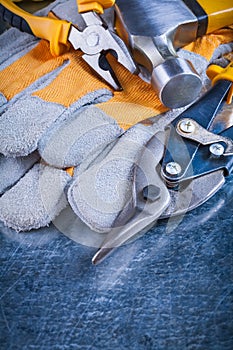 Safety gloves with claw hammer pliers and tin