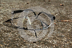 Safety Goggles On Rough Concrete