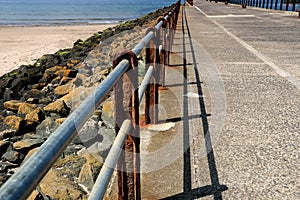 Safety Handrail with Shadow at a Coastal Jetty Location