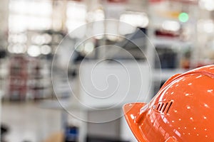 Safety helmet against industrial background