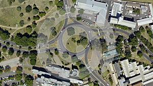 Safety makes the world go round. 4k drone footage of vehicles driving around a traffic circle in Cape Town, South Africa