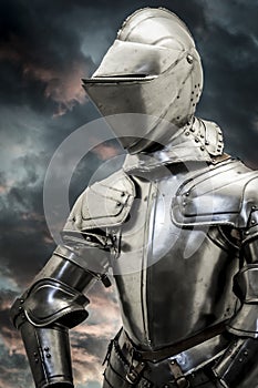 Safety.Medieval armor over clouds background. Concept of firewall protection