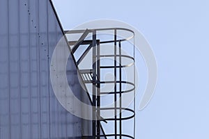 Safety metal ladder to roof