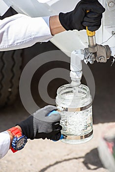 Safety officer opening the fuel tap