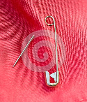 Safety Pin Means Sewing Needle And Dressmaking