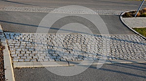 Safety ramp for slowing down traffic to a residential street where children play and it is necessary to strictly limit the speed o