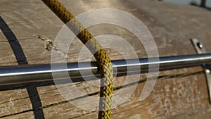 Safety rope slips over metal rod close-up